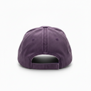 A washed purple cotton baseball cap shown from the back, featuring a curved snapback closure, on a clean white background.