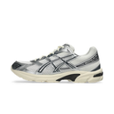 Silver and black athletic shoe on a white background
