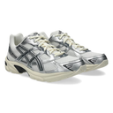 Silver and black athletic shoes on a white background