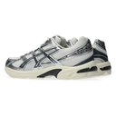 Gray and black athletic shoe on a white background
