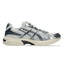 Silver and black athletic shoe on a white background