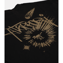 Close-up of a black T-shirt featuring a distressed tan graphic print with stylized lettering, a meteor, and a circular burst design.