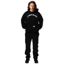 Person wearing a black hoodie with a logo on a white background