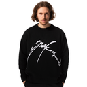 Man wearing a black sweatshirt with a white logo on a white background