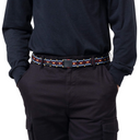 Person wearing a black shirt and pants with a colorful belt on a white background