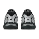 A pair of Asics athletic sneakers shown from the back, featuring a silver and black color scheme with the Asics logo visible on the heel.