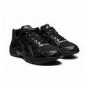 Black athletic shoes with 'RS' logo on a white background