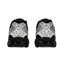 A pair of Nike Air Max 2013 sneakers shown from the back, featuring a black and white design with gray accents and the 'GEL' logo on the heel counter.