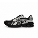 A black and white ASICS sneaker shown from the side profile against a plain white background.