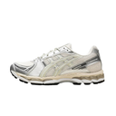 A white and silver running shoe with a beige midsole and black outsole, shown in a side profile view against a plain white background.