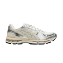 A white and silver running shoe with beige accents, shown in a side profile view against a plain white background.