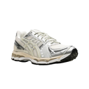 A white and silver running shoe with black and beige accents, shown from a side profile on a white background.