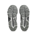A pair of gray athletic sneakers shown from the sole view, displaying the textured tread patterns on a clean white background.