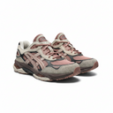 A pair of retro athletic sneakers in dusty pink, beige, and dark gray, shown from a three-quarters angle on a plain white background.