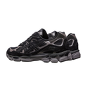 Black and red athletic shoes on a white background