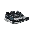 A pair of Asics running shoes in black, gray, and white with blue accents, shown from a three-quarters angle on a plain white background.