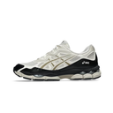 An ASICS sneaker in off-white and black, featuring the brand's signature stripe design in beige and black on the side, set against a plain white background.