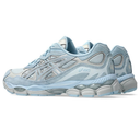 Light blue and gray running shoe on a white background