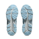 Pair of running shoes showing sole texture on a white background