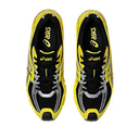 Black and yellow running shoes with Asics logo on a white background