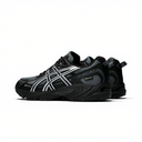 A pair of Asics running shoes in black and dark gray with white stripe accents, shown from a side profile view against a light gray background.