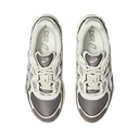 Pair of gray and white sneakers with Asics logo on a white background