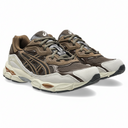 Pair of brown and gray sneakers on a white background