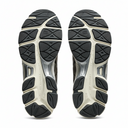 Close-up of a pair of running shoes with tread pattern on a white background