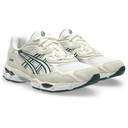 White and green running shoes on a white background