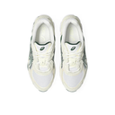 White sneakers with black accents on a white background