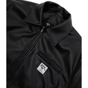 Close-up of a black jacket with a brand logo on a white background