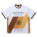 A white short-sleeve athletic jersey with gold and brown diagonal panels, black and gold trim on the collar and sleeves, and printed text reading 'BXR SPORT Worldwide' and 'ON THE TURF'.