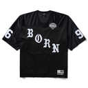A black short-sleeve athletic jersey with 'BORN' printed in large white Gothic letters across the front. The jersey features a V-neck, a small 'Born in the City' patch on the left chest, the number 6 on the right sleeve, and the number 9 on the left sleeve, with a jock tag on the lower right hem.