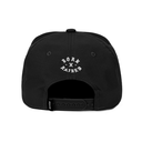 Black snapback cap shown from the back, featuring a white circular graphic on the front panel that reads 'F*CK X RAISE' with a star and knife motif, and an adjustable black strap with a small white 'RAISE' tag on the side.
