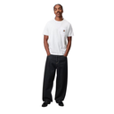 Man wearing a white t-shirt and black pants on a white background