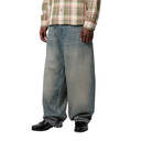 Person wearing a plaid shirt and baggy jeans on a white background