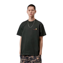 A model wearing a dark charcoal gray oversized t-shirt with a small yellow and red graphic on the left chest, paired with camouflage pants, shot against a solid white background.