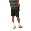 Person wearing black shorts, striped shirt, and white socks on a white background
