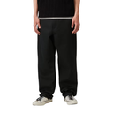 Person wearing black pants and white sneakers on a white background