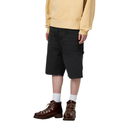Person wearing black shorts, a yellow sweatshirt, and brown boots on a white background