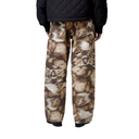 Camouflage pants worn by a person on a white background