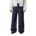 Person wearing wide-leg jeans and a light-colored jacket on a white background