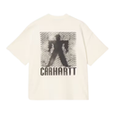 An off-white Carhartt short-sleeve t-shirt with a large black graphic on the front featuring a silhouette of a person inside a square grid and the brand name 'CARHARTT' printed below.
