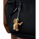 A black Carhartt shoulder bag with a mesh pocket, featuring a dangling keychain charm shaped like a cartoon duck character in tan and green, attached to a silver zipper pull.