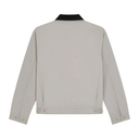 A light beige utility jacket shown from the back, featuring a contrasting black collar and button details on the cuffs and hem, set against a plain white background.