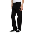 Person wearing black jeans on a white background