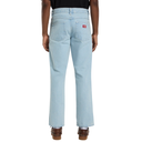 Light blue jeans worn by a person on a white background