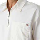 White jacket with a Dickies logo on the chest pocket against a white background