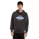 A man wearing a dark gray washed hoodie with a distressed blue and red Dickies logo on the chest, set against a plain white background.