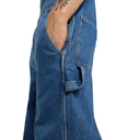Close-up of blue denim shorts with a white background